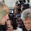 Court Hearings. Michael gives his testimony in a $21 million lawsuit over canceled millennium concerts.