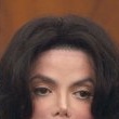 Court Hearings. Michael gives his testimony in a $21 million lawsuit over canceled millennium concerts.