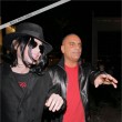 Michael and Christian Audigier do some shopping at Dior and Dolce & Gabbana at Rodeo Drive