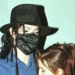 Michael and ex-wife Lisa-Marie Presley share an intimate moment outside of The Ivy restaurant in Beverly Hills.