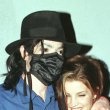 Michael and ex-wife Lisa-Marie Presley share an intimate moment outside of The Ivy restaurant in Beverly Hills.