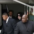 Michael and his children arrive at Los Angeles International Airport.
