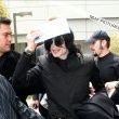 Michael and his children arrive at Los Angeles International Airport.