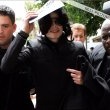 Michael and his children arrive at Los Angeles International Airport.