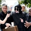 Michael and his children arrive at Los Angeles International Airport.