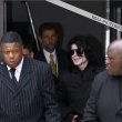 Michael and his children arrive at Los Angeles International Airport.