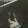 Michael and his children arrive at Los Angeles International Airport.