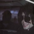 Michael and his children arrive at Los Angeles International Airport.