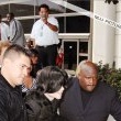 Michael and his children arrive at Los Angeles International Airport.