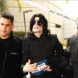 Michael and his children arrive at Los Angeles International Airport.