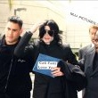 Michael and his children arrive at Los Angeles International Airport.