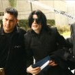 Michael and his children arrive at Los Angeles International Airport.