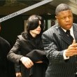 Michael and his children arrive at Los Angeles International Airport.