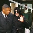 Michael and his children arrive at Los Angeles International Airport.
