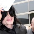 Michael and his children arrive at Los Angeles International Airport.
