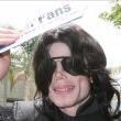 Michael and his children arrive at Los Angeles International Airport.