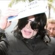 Michael and his children arrive at Los Angeles International Airport.