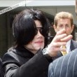 Michael and his children arrive at Los Angeles International Airport.