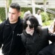 Michael and his children arrive at Los Angeles International Airport.