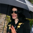 Michael and his children leave the Beverly Hills Hotel