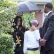 Michael and his children leave the Beverly Hills Hotel
