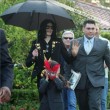 Michael and his children leave the Beverly Hills Hotel