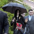 Michael and his children leave the Beverly Hills Hotel
