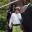 Michael and his children leave the Beverly Hills Hotel