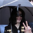 Michael and his children leave the Beverly Hills Hotel