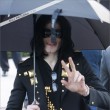 Michael and his children leave the Beverly Hills Hotel