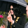 Michael and his children leave the Beverly Hills Hotel