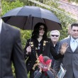 Michael and his children leave the Beverly Hills Hotel