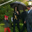Michael and his children leave the Beverly Hills Hotel