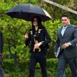 Michael and his children leave the Beverly Hills Hotel