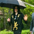 Michael and his children leave the Beverly Hills Hotel