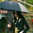Michael and his children leave the Beverly Hills Hotel