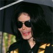 Michael and his children leave the Beverly Hills Hotel