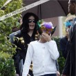Michael and his children leave the Beverly Hills Hotel