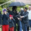 Michael and his children leave the Beverly Hills Hotel