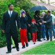 Michael and his children leave the Beverly Hills Hotel