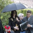 Michael and his children leave the Beverly Hills Hotel