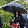 Michael and his children leave the Beverly Hills Hotel