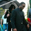Michael and his children leave the Beverly Hills Hotel