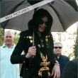 Michael and his children leave the Beverly Hills Hotel