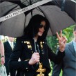 Michael and his children leave the Beverly Hills Hotel