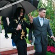 Michael and his children leave the Beverly Hills Hotel