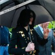 Michael and his children leave the Beverly Hills Hotel