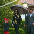 Michael and his children leave the Beverly Hills Hotel