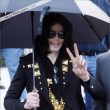 Michael and his children leave the Beverly Hills Hotel