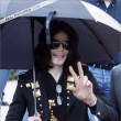 Michael and his children leave the Beverly Hills Hotel